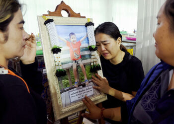 Flowers and Toys at the Funeral of Thai School Bus Fire Victims