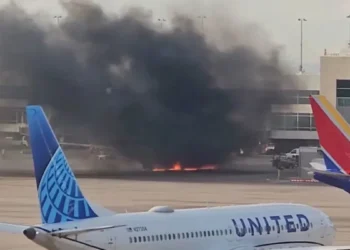 When the Engine of an American Airlines Aircraft Catches Fire at Denver Airport, Passengers are Evacuated onto a Wing