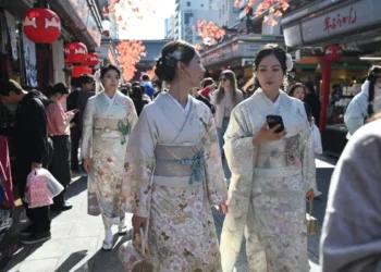 Travel and Retail Stocks in Japan Decline Following a Dispute with China Over Taiwan