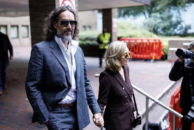 Russell Brand’s Wife Describes Him as “Kind and a Wonderful Father” During his Rape Trial